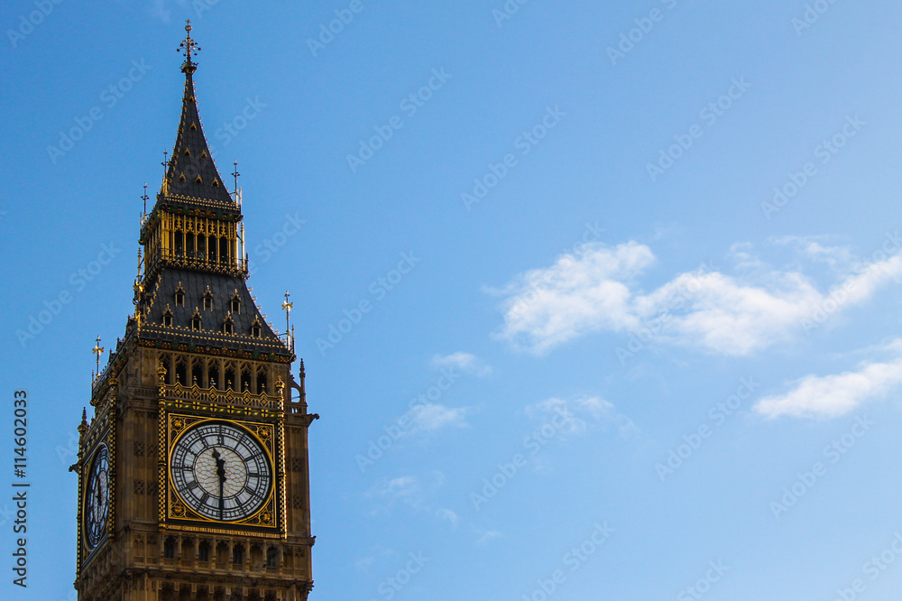 big ben in london seen in daylight with blue sky