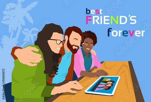 Friends Group Looking At Photo On Tablet Computer