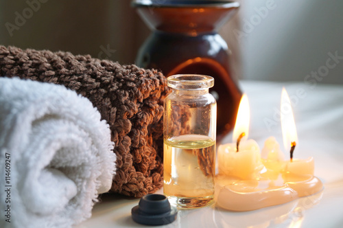 Spa set with essential oils, towel and aromatic candles 