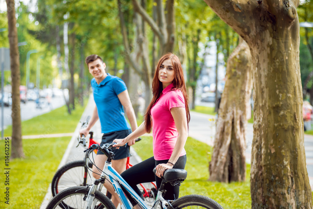 Fototapeta premium Cycling young couple.