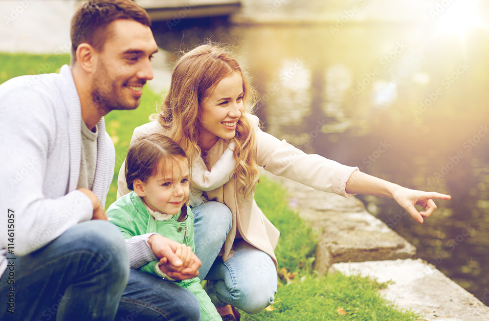 happy family walking in summer park