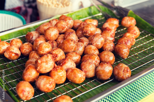 fried meatballs sale at street market