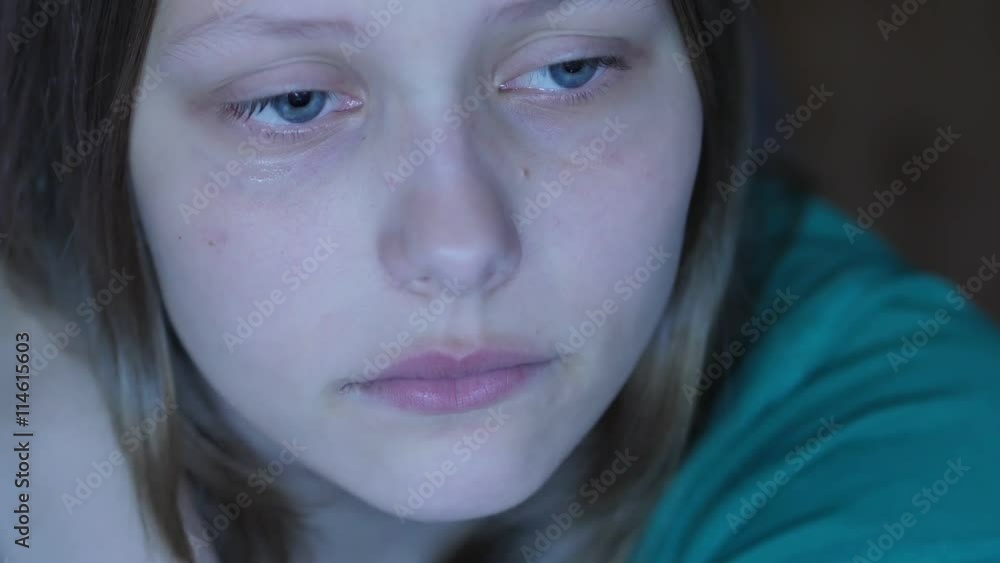 Depressed teen girl crying alone. 4K UHD. Depressed teen girl crying alone. 4K UHD.