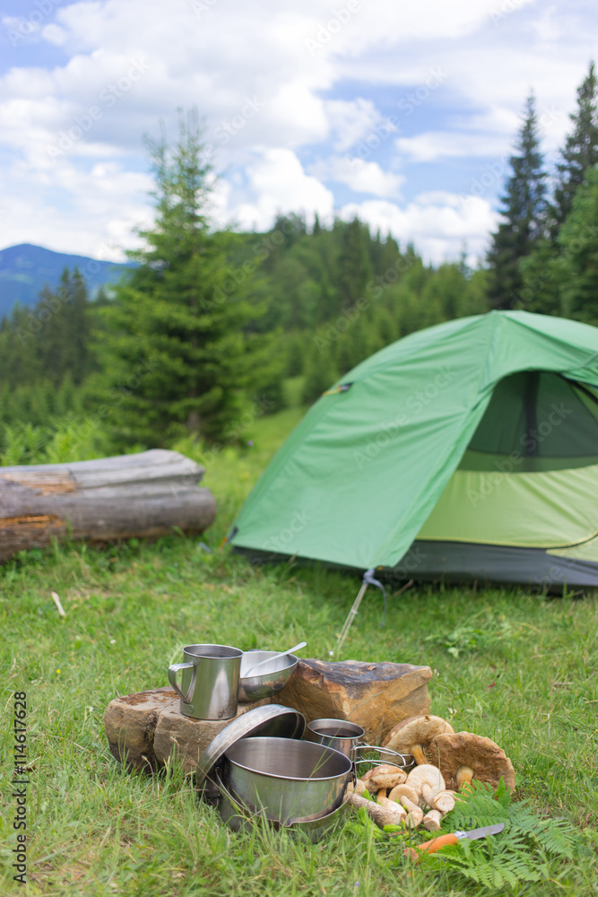 Camping in a mountainous area with cooking equipment. - obrazy, fototapety, plakaty 