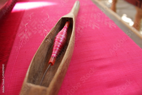 weaves with an old loom, farabic textile handcraft photo