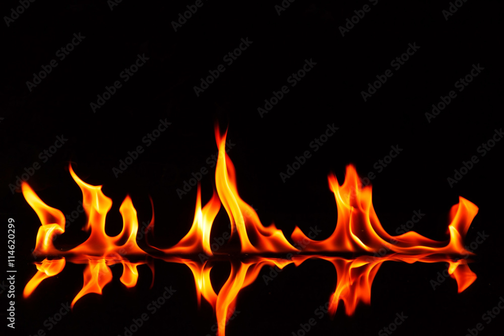 Fire flames and shadow on black background. Fire flames and shadow on black background.
