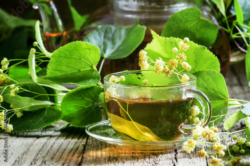 Traditional Russian linden tea, flowers and linden branches, a v
