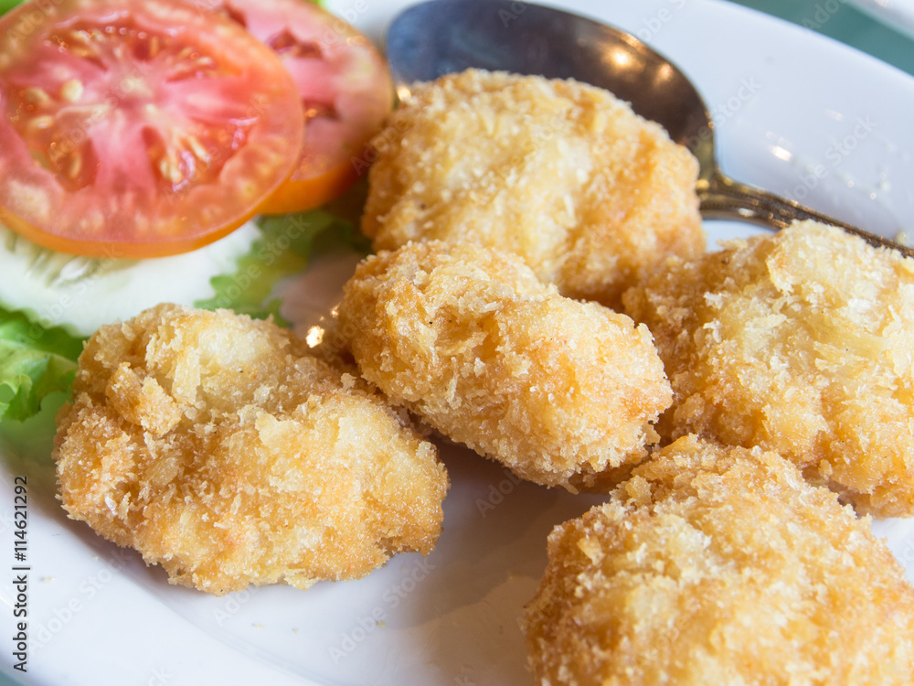 Fried Prawn Cake, crab Cake on a white plate. Fried Prawn Cake, crab Cake on a white plate.