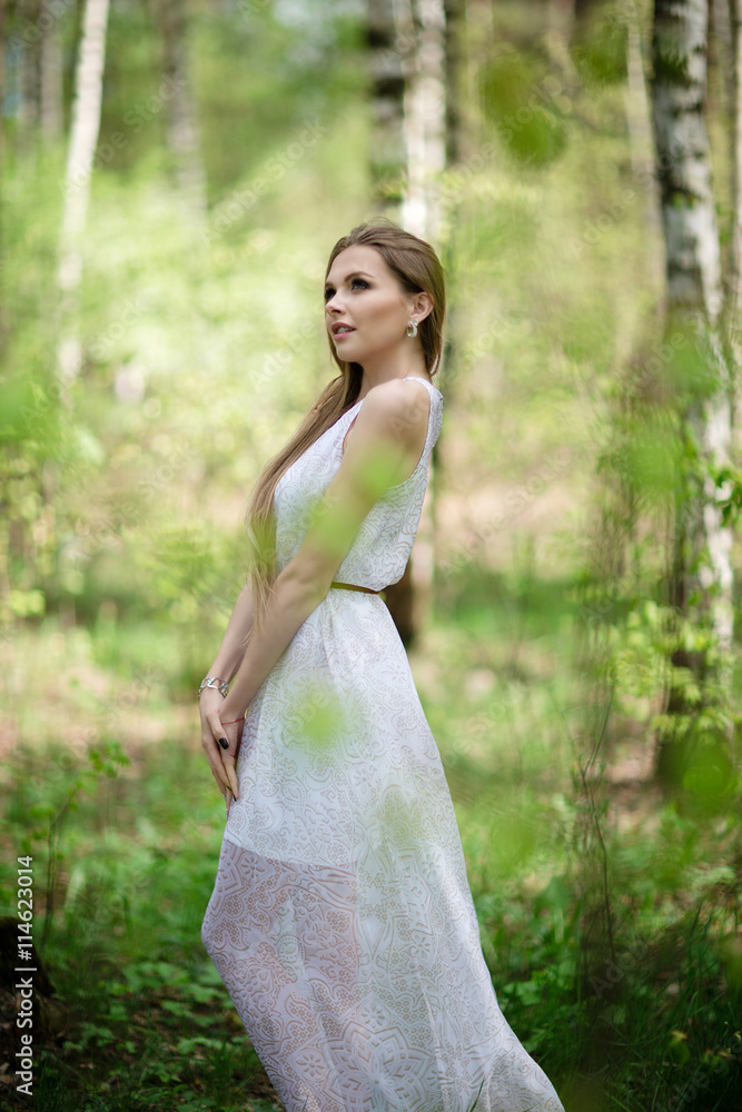 portrait of young woman in the forest portrait of young woman in the forest
