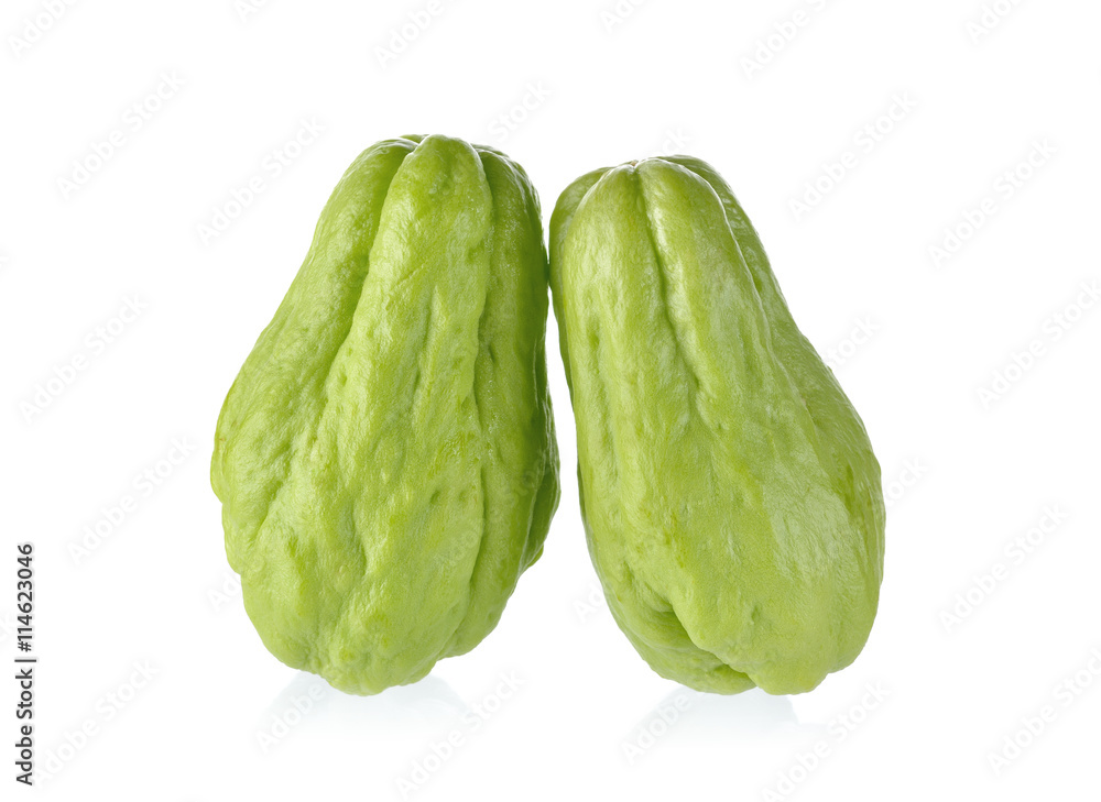 uncooked whole fresh chayote on white background