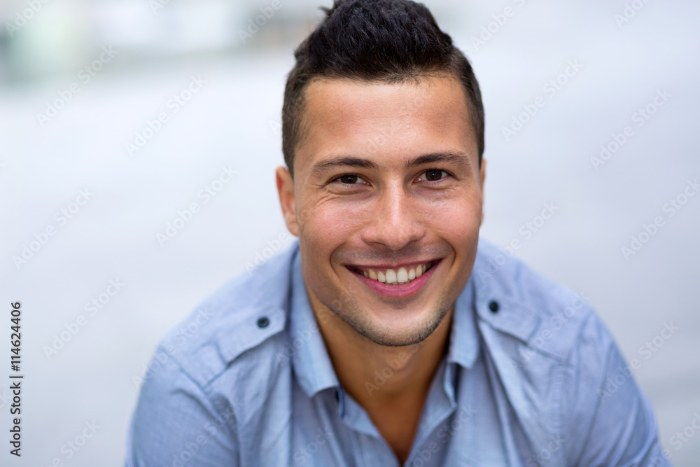 Young man smiling
Young man smiling