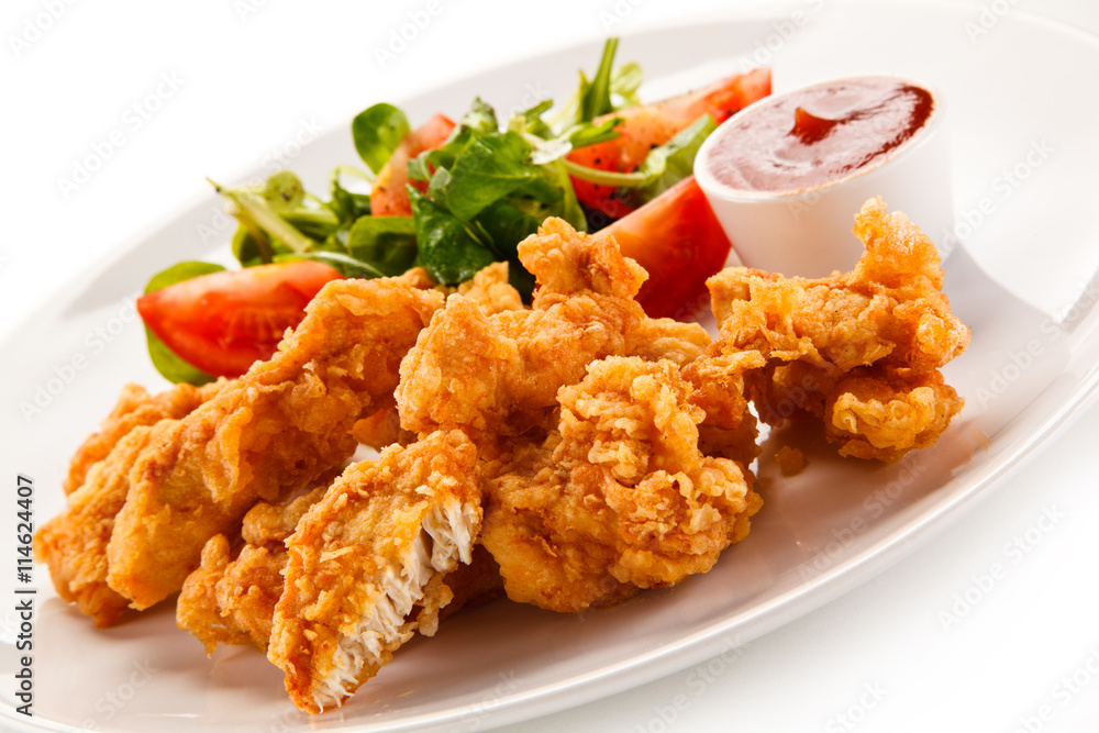 Fried chicken nuggets and vegetables Fried chicken nuggets and vegetables