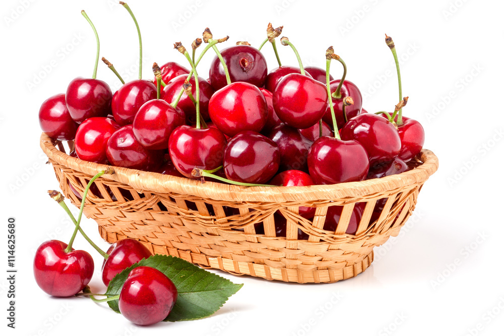 cherries in a wicker basket isolated on white background cherries in a wicker basket isolated on white background