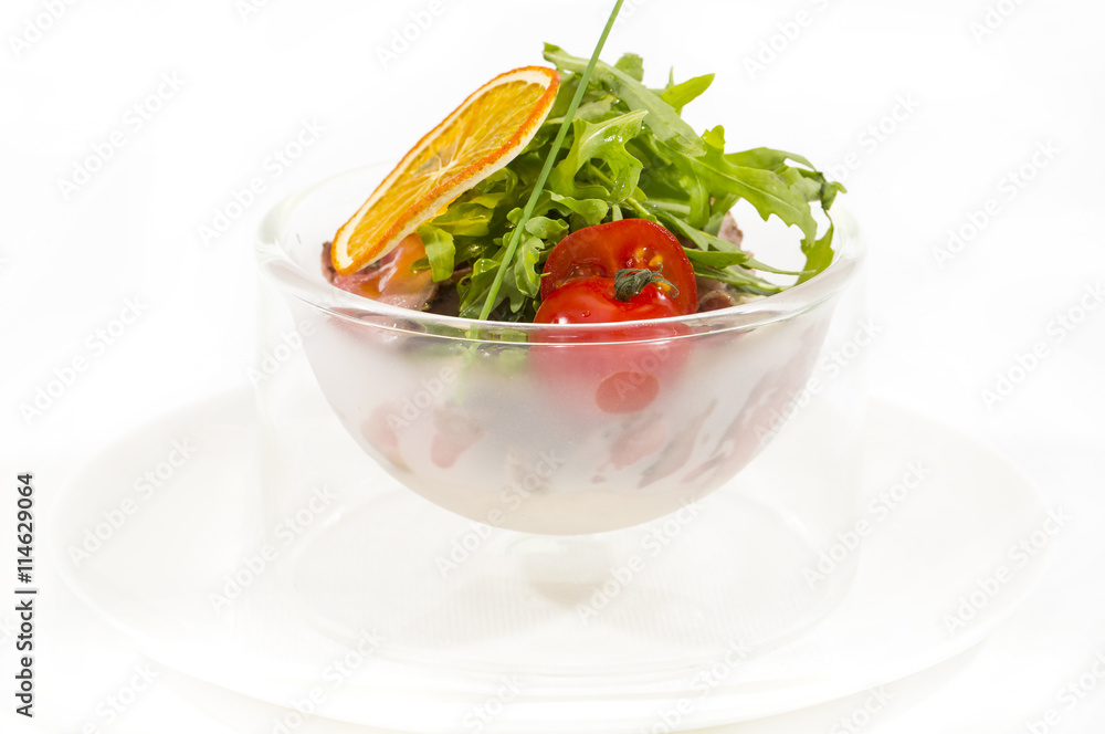 tomatoes and cheese on white plate in a restaurant tomatoes and cheese on white plate in a restaurant