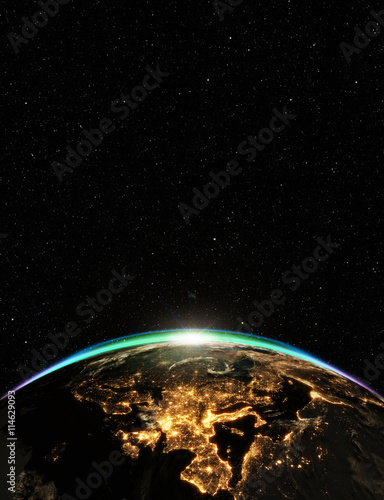 Highly detailed epic sunrise over world skyline. Planet earth Europe zone with night time city. 3D Rendering animation using satellite imagery (NASA)