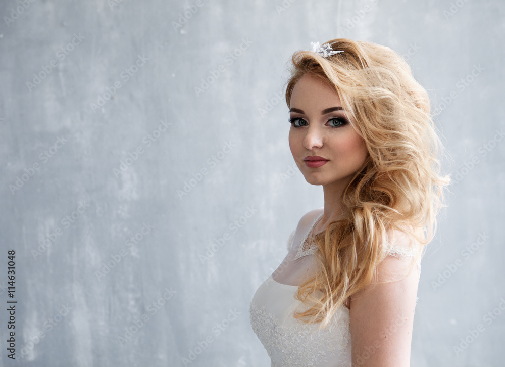 Portrait of young beautiful bride over white background Portrait of young beautiful bride over white background