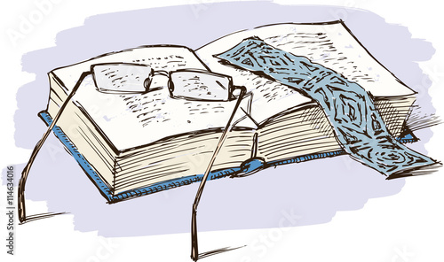 book and eyeglasses