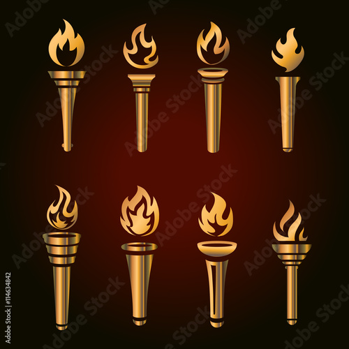 Set of golden torches, flaming gold torch simbol