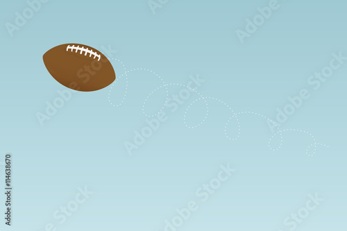 Football spiraling through the air