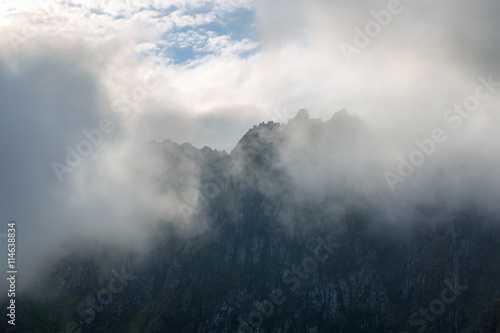 The tops of the mountains in the clouds, Norway