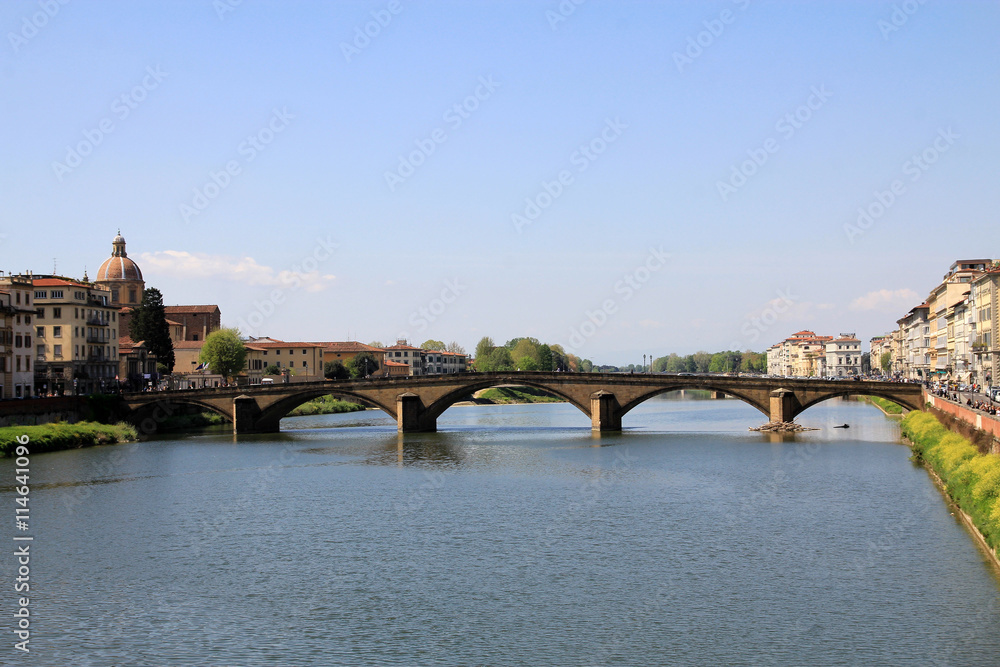 Urban landscape with bridge over river Arno in Florence, Italy