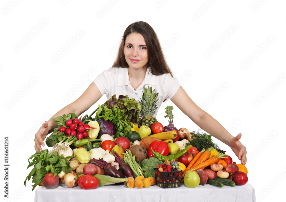 woman at the table with fruits and vegetables woman at the table with fruits and vegetables