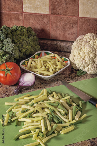 Preparation of raw vegetables in the kitchen
