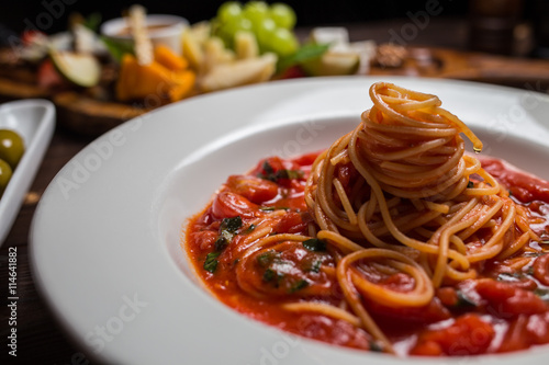 pasta seafood in tomato sauce with shrimp and tomatoes