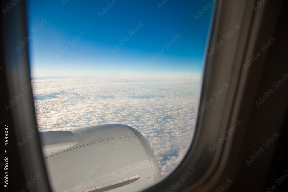 Wing of the plane on blue sky Wing of the plane on blue sky