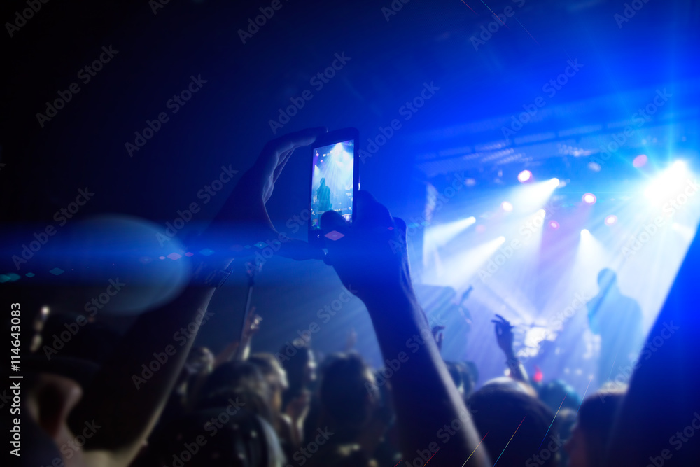 Silhouettes of people and musicians