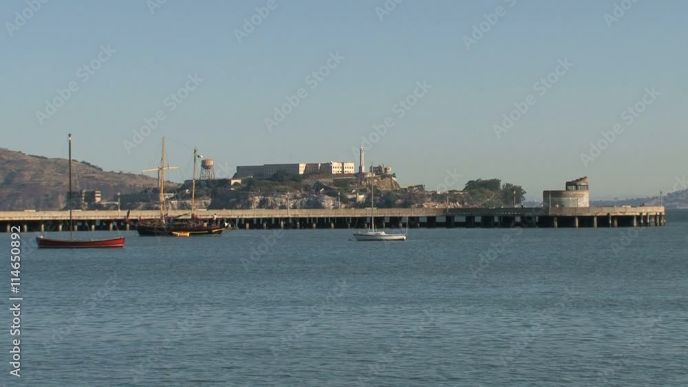 San Francisco bay with Sailboats and Alcatraz at the background in the morning San Francisco bay with Sailboats and Alcatraz at the background in the morning
