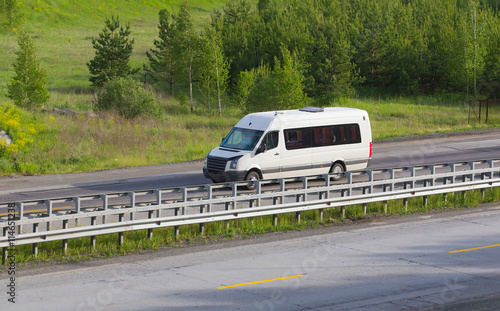 minibus goes on the country highway