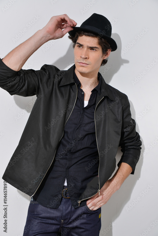Casual young man with hat i Casual young man with hat i