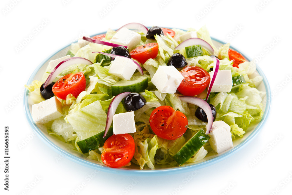 Greek salad on white background Greek salad on white background