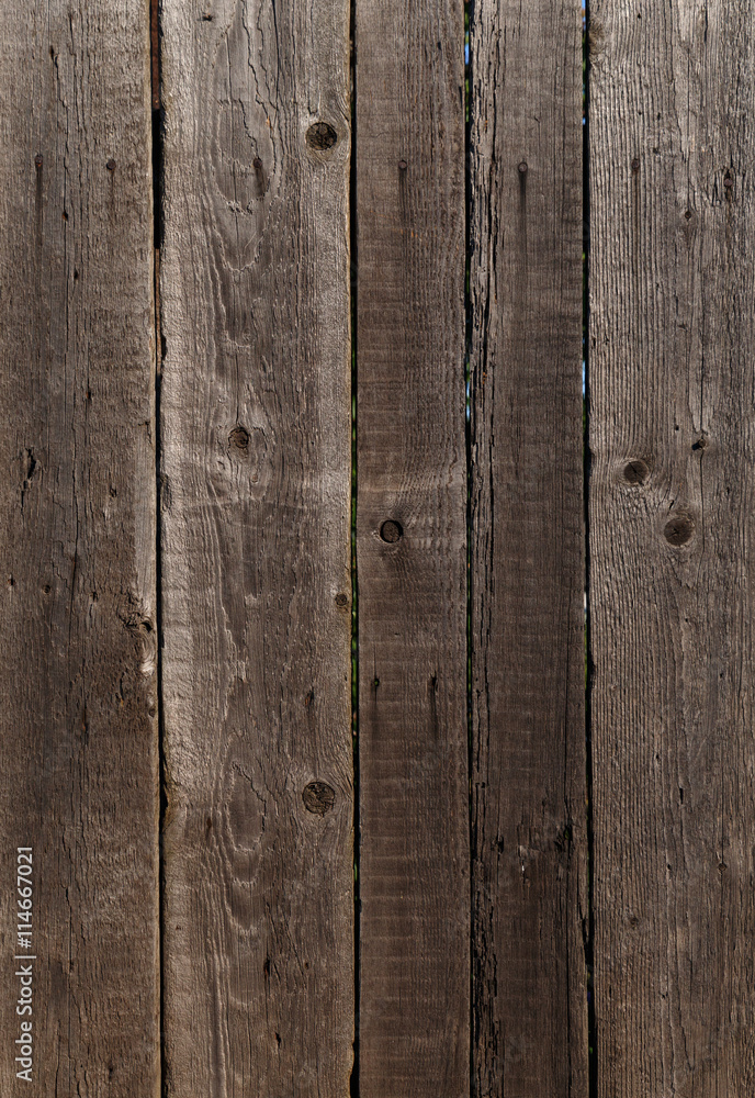 dark gray wood background: fence made of planks dark gray wood background: fence made of planks