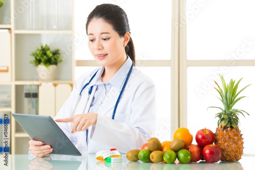 Doctor nutritionist with fruits and vegetable