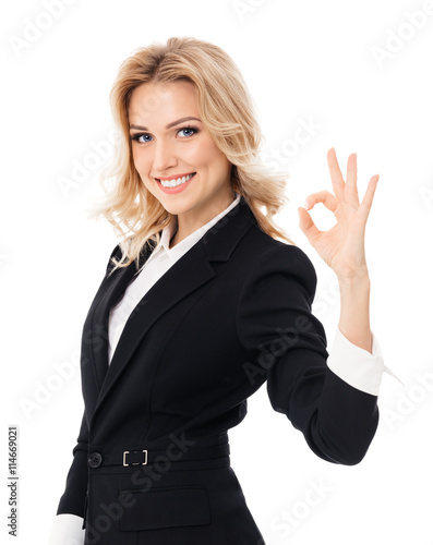 businesswoman showing okay gesture, isolated