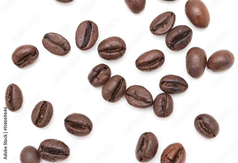 roasted coffee beans on a white background roasted coffee beans on a white background