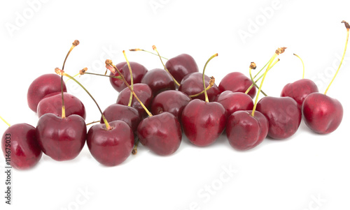 red cherries on a white background