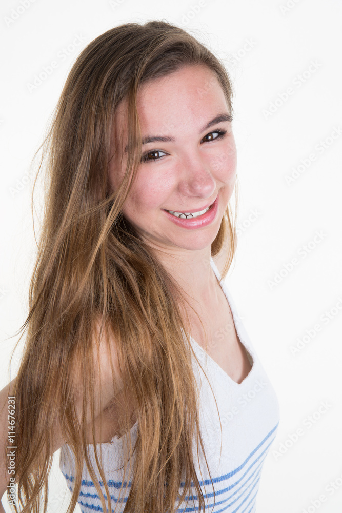 Casual woman model posing standing with jeans and shirt isolated on a white background Casual woman model posing standing with jeans and shirt isolated on a white background