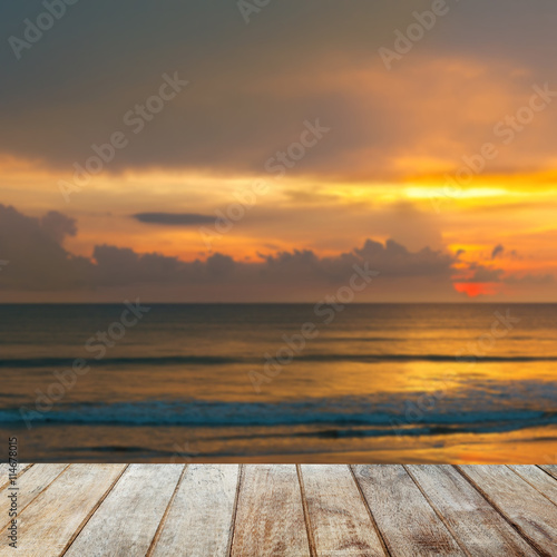 Wood Terrace on The Beach with Sunset © seksanpk