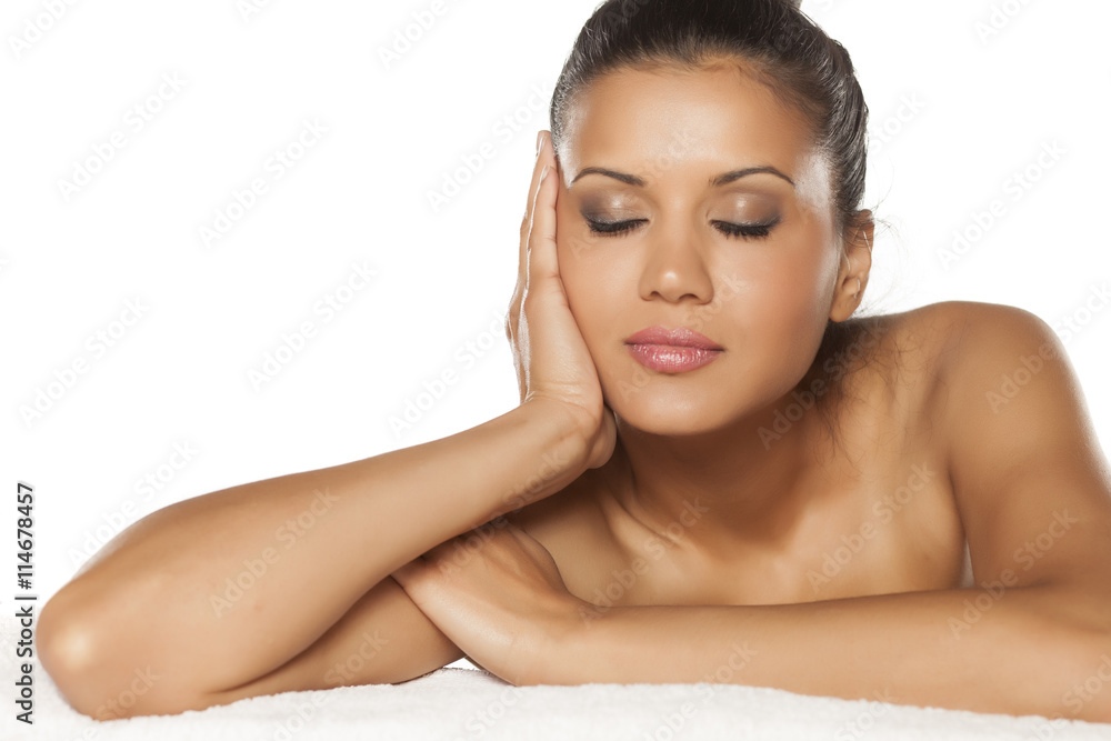 beautiful young latina lying on the towel beautiful young latina lying on the towel