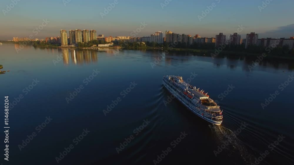 the ship is on the river at sunset the ship is on the river at sunset
