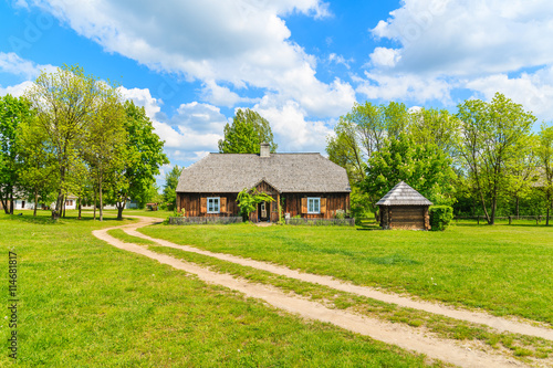 Rural road in Tokarnia village on sunny beautiful spring day, Poland © pkazmierczak