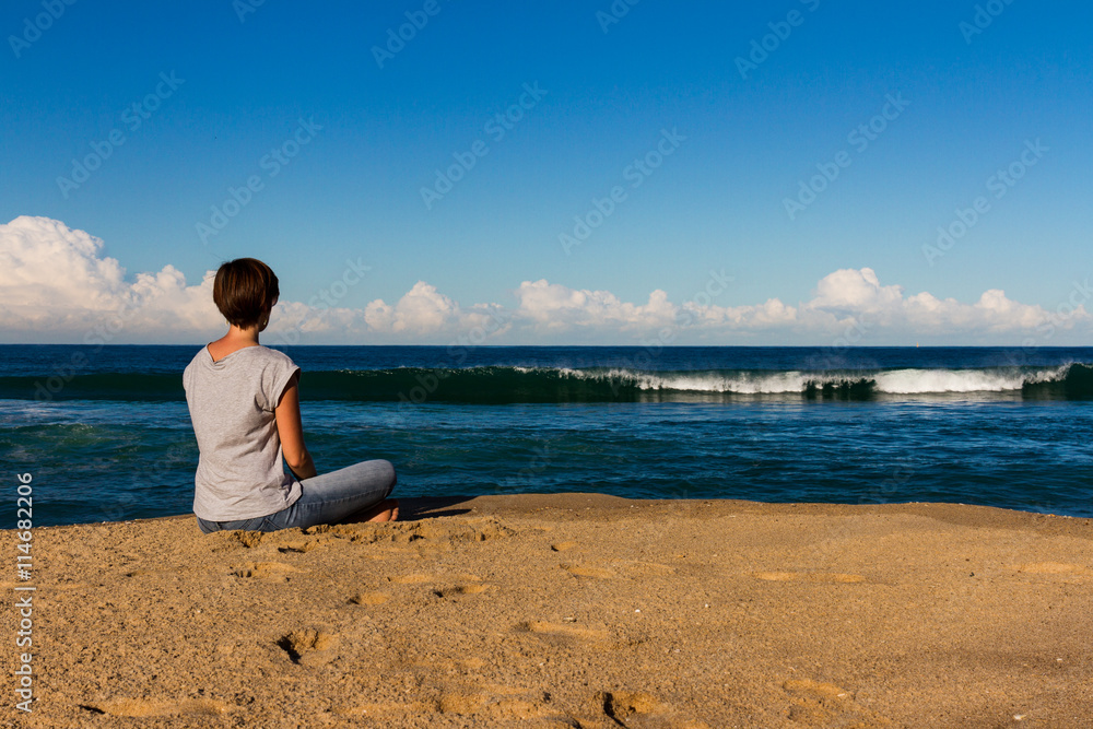 Young Woman relax on a Beach