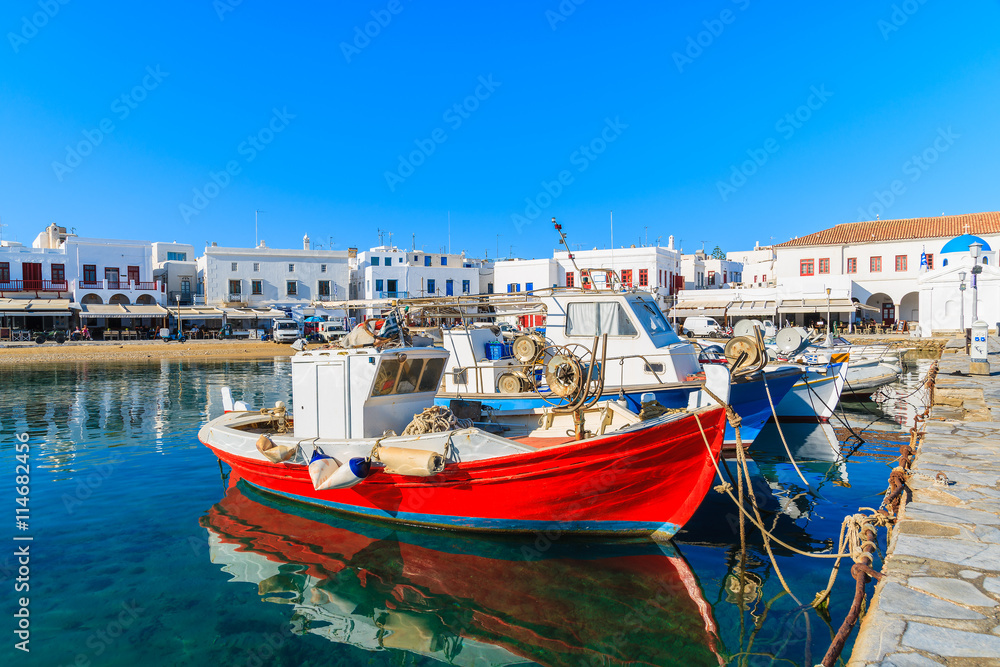 Greek fishing boats mooring in Mykonos port on island of Mykonos, Cyclades, Greece