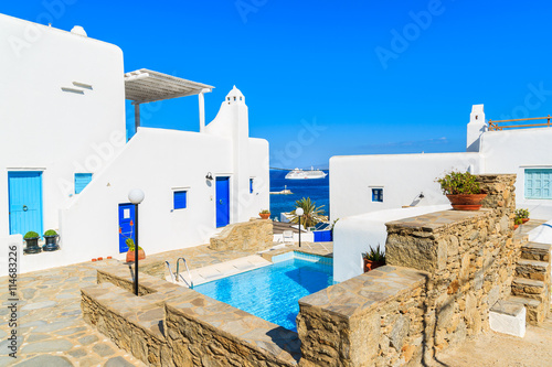MYKONOS ISLAND, GREECE - MAY 17, 2016: luxury holiday apartments with swimming pool in beautiful Mykonos town, Cyclades islands, Greece.
