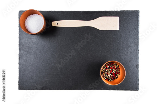 colored peppers and salt, top view, isolated