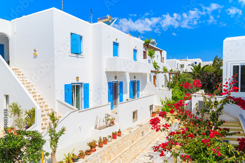 Beautiful Greek style holiday apartments on street of Naoussa village, Paros island, Cyclades, Greece