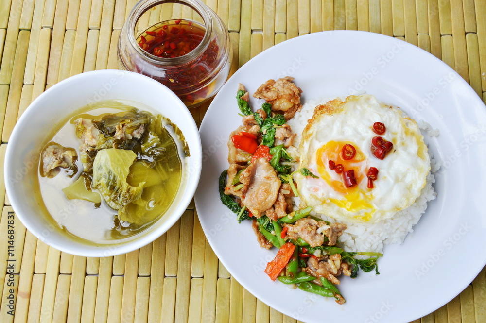 spicy stir fried pork and basil leaf on rice eat with pickled cabbage soup spicy stir fried pork and basil leaf on rice eat with pickled cabbage soup